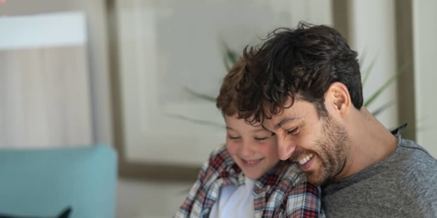 a father reading to his child